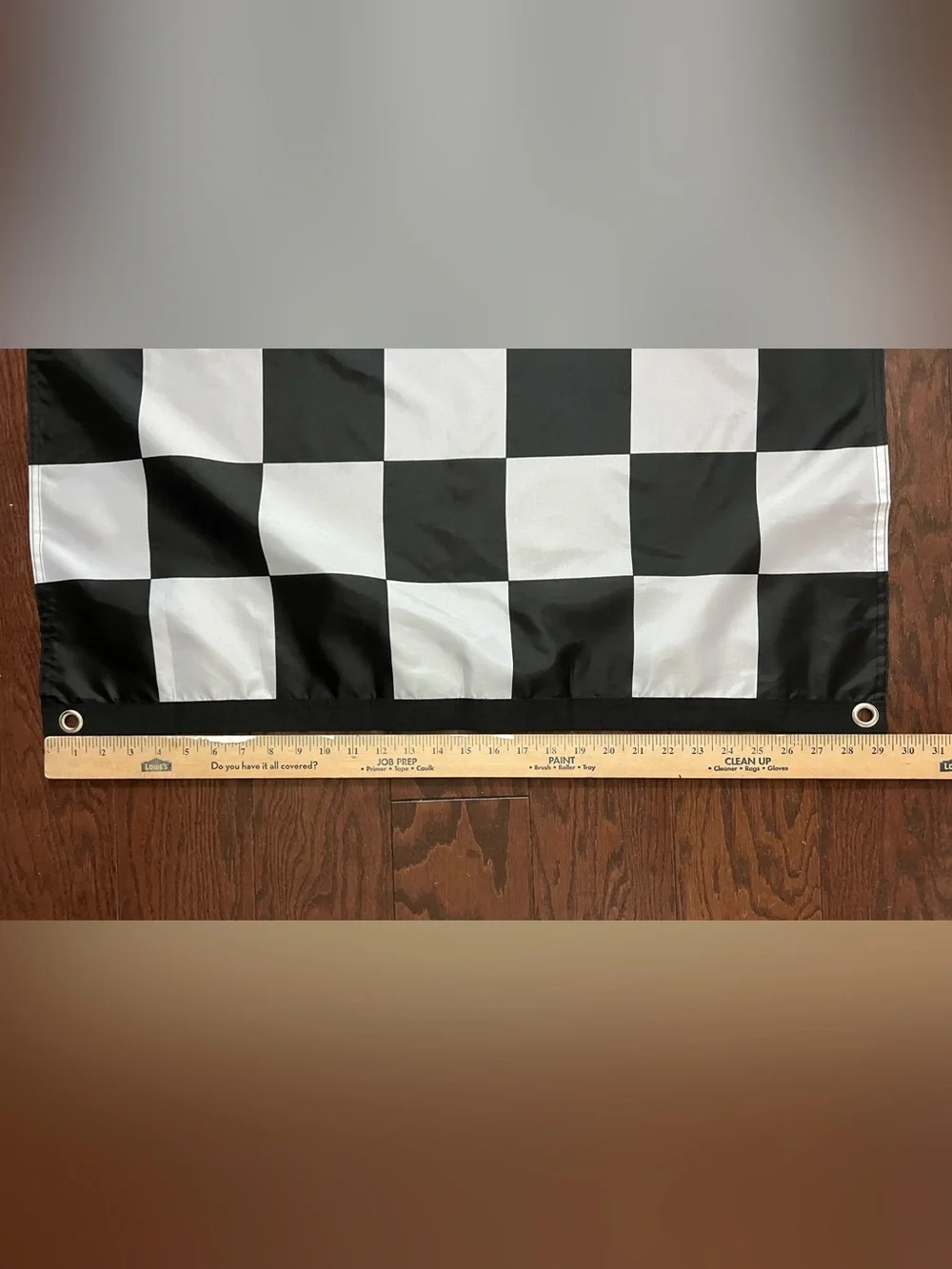 Vans Black and White Checkerboard Banner with Red Accent